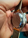 105.003-63 ed white omega speedmaster with rare decimal bezel at Brittons watches